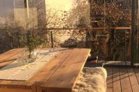 Terrassenüberdachung mit Schiebetüren aus Glas